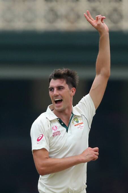Australian fast bowler Pat Cummins in action on the third day of the Sydney Test on January 5. Photo: Getty Images.
