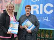 Liberal candidate Sarah Richards with Liberal Senator Marise Payne at East Blaxland on election day.