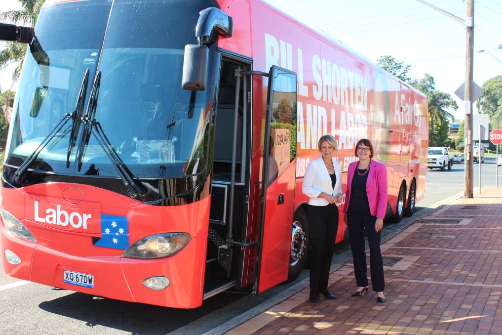 Senator Keneally and Ms Templeman next to the Bill Shorten campaign bus parked in Windsor on Wednesday.