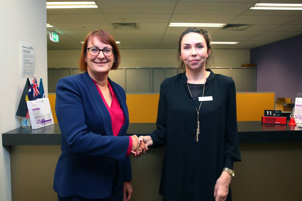 Re-elected: Macquarie MP Susan Templeman with the AEC's Kathleen Fogarty at the official declaration of the Macquarie poll at the Penrith offices of the AEC. Picture: Geoff Jones.