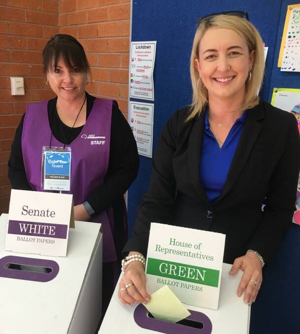 Liberal candidate Sarah Richards casts her vote at Bligh Park. Picture: Geoff Jones.