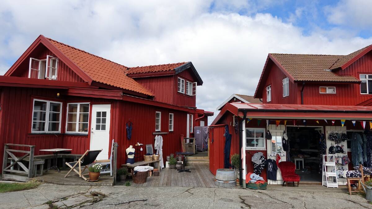 Classic west coast boathouses on Krringn, an Island in the archipelago. Most houses and barns are painted in this colour known as falurd (falu red). Picture: Lily Ray
