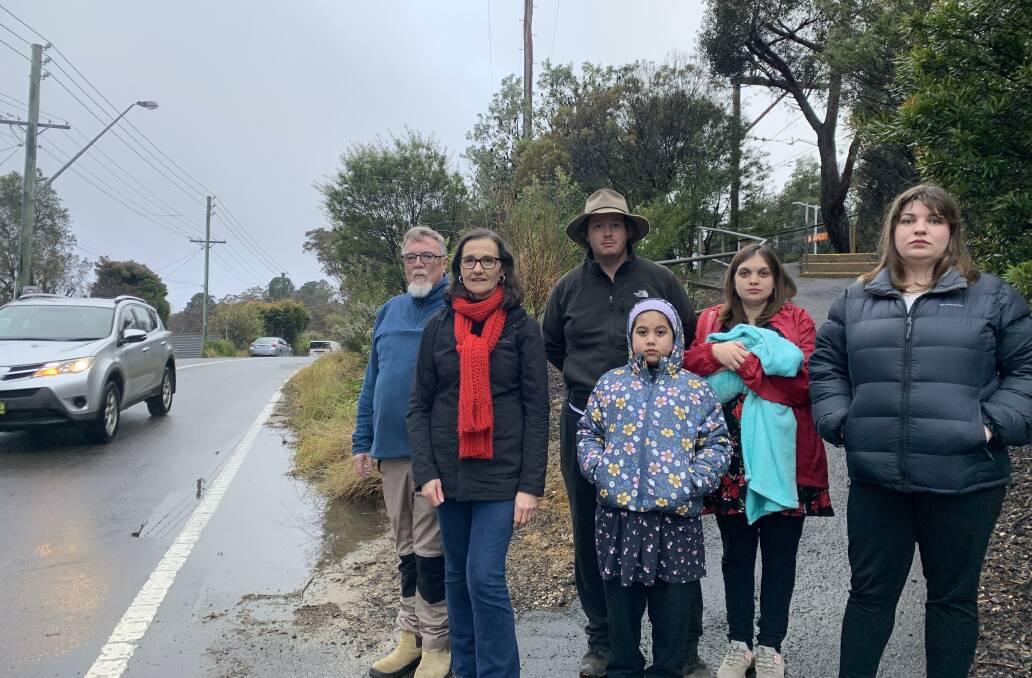 Sight line issues on the northern side of Bullaburra station: Residents Gary Hyland and Adam and Bernadette Bielderman with daughter Elaria and their newborn Edward, with Crs Romola Hollywood and Claire West.