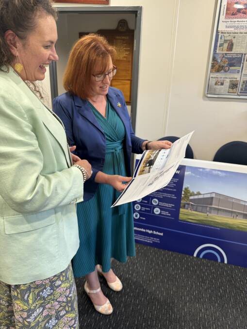 MP Trish Doyle and Katoomba High School principal, Tess Devine, looking over plans for the schools new NSW government funded multi-purpose facility.