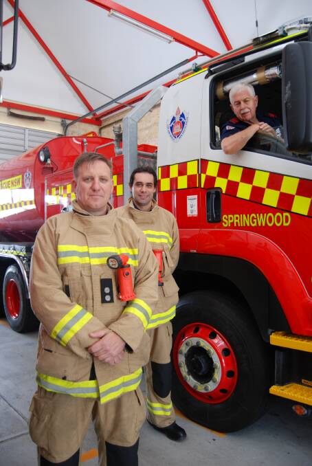 Celebrating their new tanker: Station Officer Rod Kinder is delighted to see the new CAFS tanker coming out of the station recently. Pictured with firefighters John Dufty and Ian Priest.