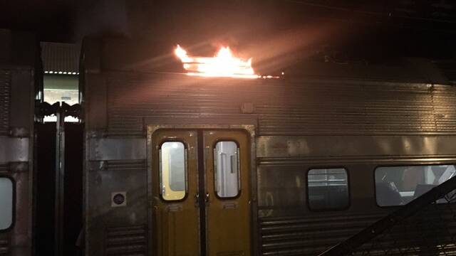 The scene of the train fire at Lawson on March 7. Photo: Springwood Fire and Rescue Facebook and Garry Maxwell.