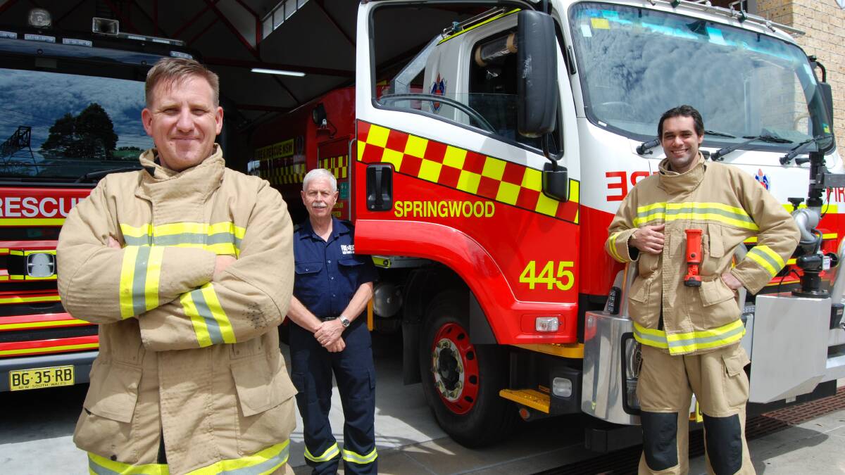 "Where they should be": Station Officer Rod Kinder is delighted to see the new CAFS tanker coming out of the station recently. Pictured with firefighters John Dufty and Ian Priest.