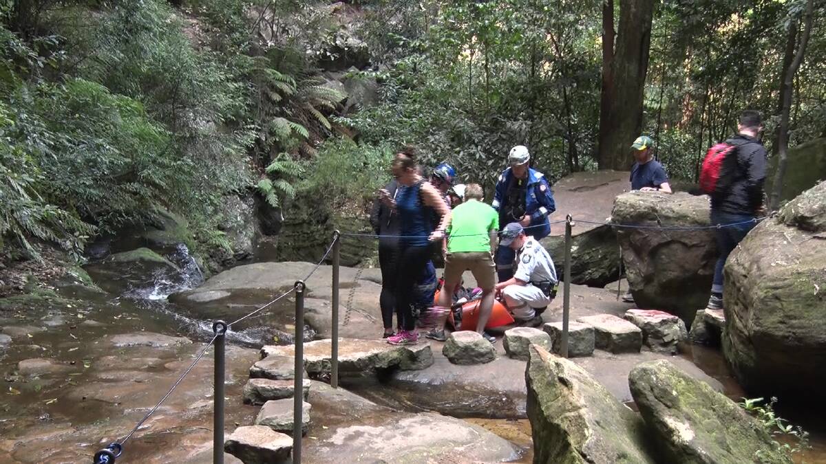 Cliff fall at Empress Canyon, Wentworth Falls: Woman falls three metres down cliff while abseiling. Photos: Top Notch Video