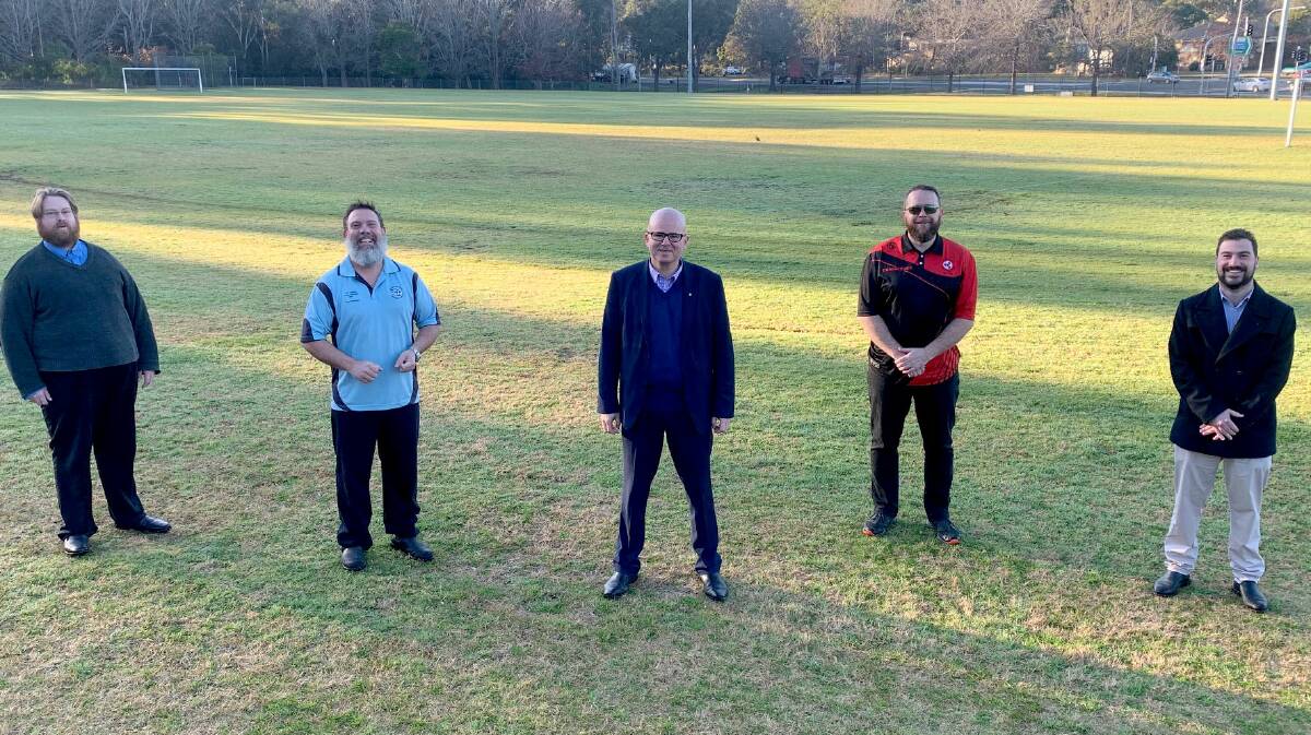 Fee reprieve: Blue Mountains City Council has waived sportsground fees for the current Winter and next Summer season, to support the community following bushfires and COVID-19. Sports Council Chair Cr Daniel Myles, Blue Mountains Football Club president David Smith, Mayor Mark Greenhill, Blaxland Redbacks Football Club president Steve Myhill and Cr Brendan Christie. 