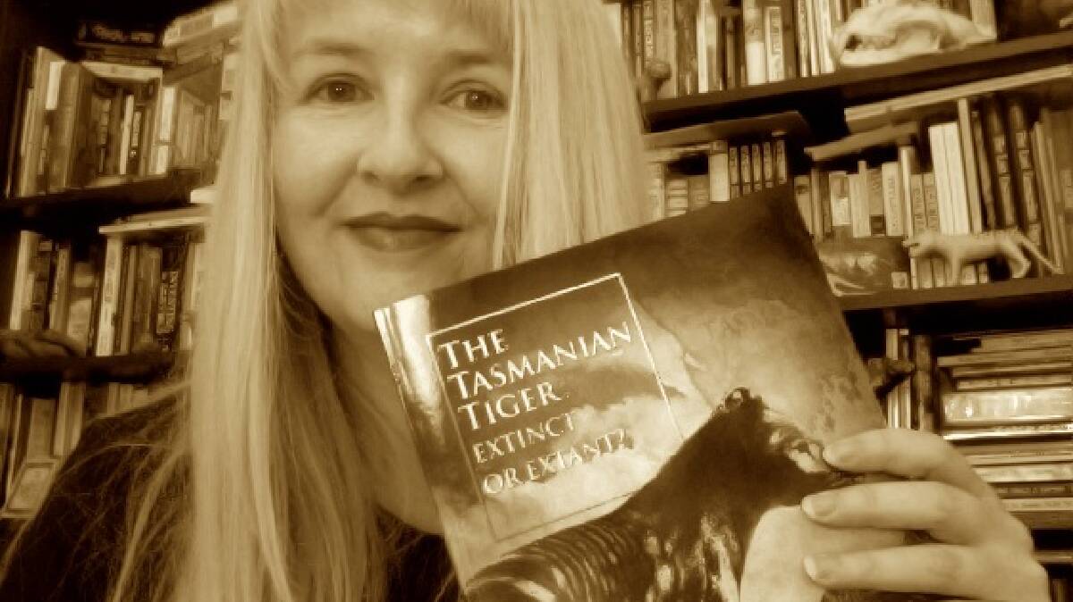 Helping others get published: Blue Mountains author Rebecca Lang with the book she edited on the Tasmanian tiger.