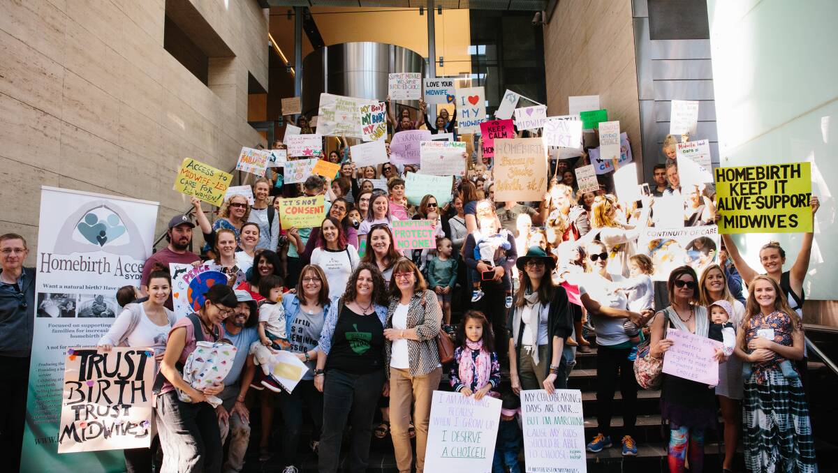 A protest in Sydney in May this year: The Mothers for Midwives March was "protesting situations like the need for PPMs to get referrals from GPs" said Dr Sing, who is second left in the second row at the bottom. Photo: Jerusha Sutton Photography