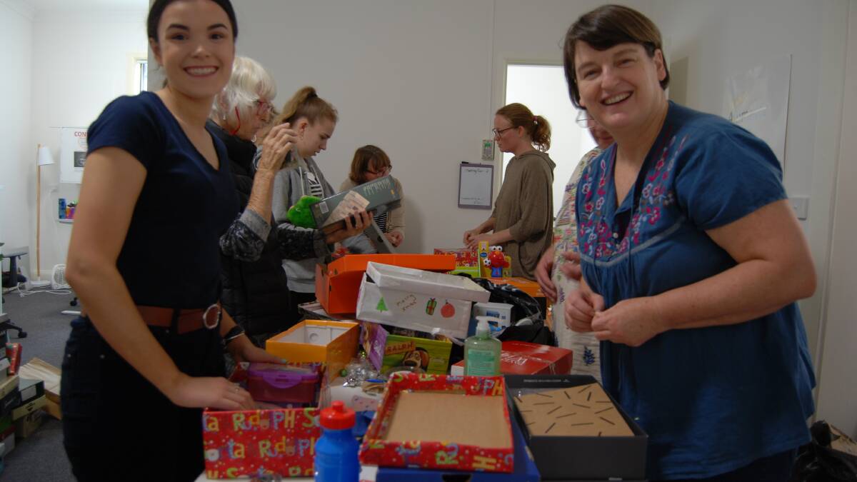 A lightbulb idea by student Annabelle Baddock and powered by Sue Campbell-Ross from Mountains Youth Services Team - Christmas shoeboxes for refugees. File photo.