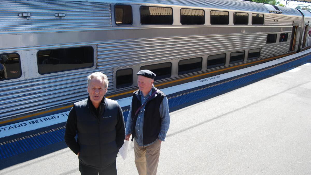This train's okay but not the coal wagons: “We’ve been pushing for action over pollution caused by the hundreds of huge coal trains that travel over the mountains every month,” says BMUC's Peter Lammiman (right) pictured with fellow member Nick Franklin.