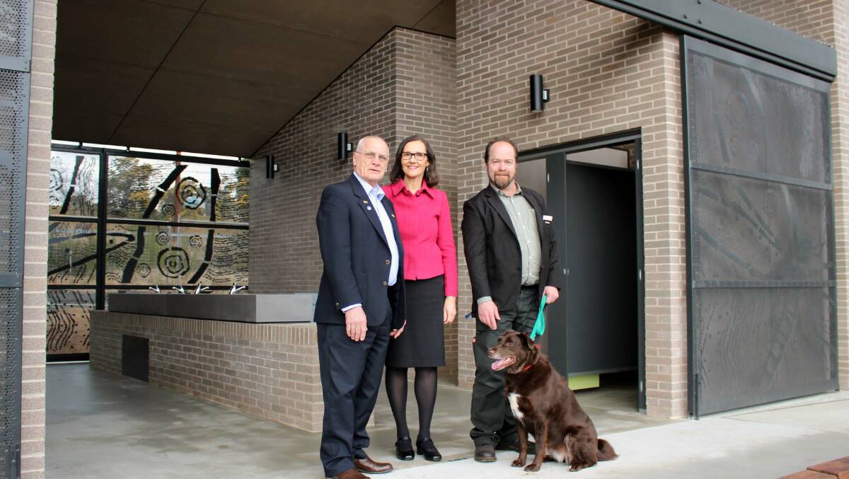 Open for business: Ward 2 Councillors, Chris Van der Kley, Romola Hollywood and Brent Hoare (with dog Thea) inspect the new loo at Wentworth Falls Lake, which opened this week.