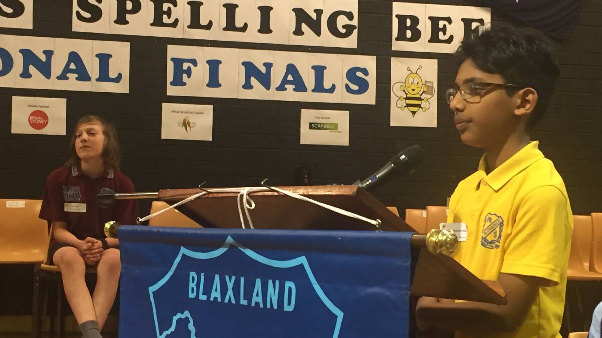Spelling bee finalists: Gibberish was the word Rupan Senthilnathan Prabhadevi was knocked out on at the regional final of the Premier’s Spelling Bee. Watching on is the ultimate winner Joshua Winsor from Ellison Public.