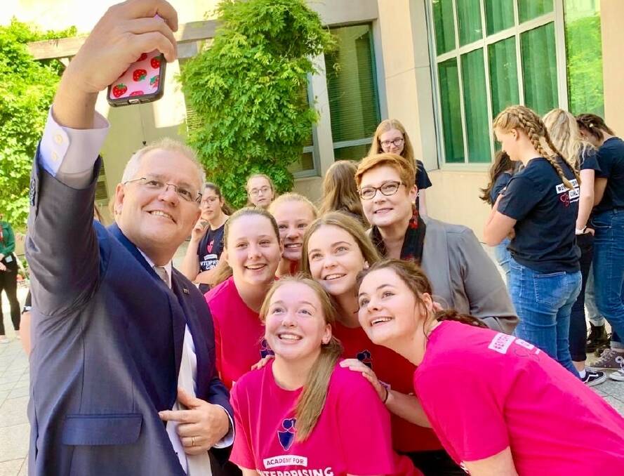 Prime Minister Scott Morrison and Senator Marise Payne with members of the Academy for Enterprising Girls at a function in Canberra.