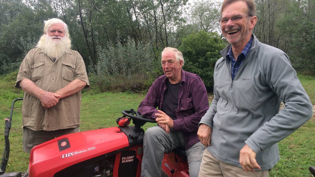 Turn off the mower: Ian Robinson, Bob Morris and Max Hill. Other lawn mowers missing from the photo are Tony Gorey and Mark Vanderwey. 