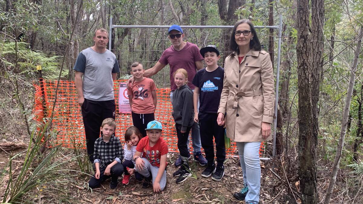 Site blocked off: (From left) Trent Sandford with Ryan, Isabella, Julian, Owen, Lou Pravdacich, as well as Isla, Tyson and Ward 2 Councillor Romola Hollywood.