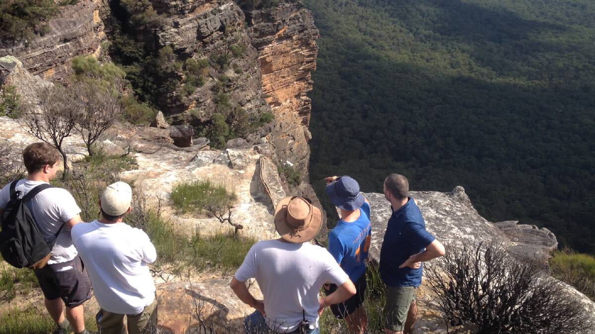 In the distance: Flintoff had to scale down a cliff and sleep on a temporary ledge in the Blue Mountains.