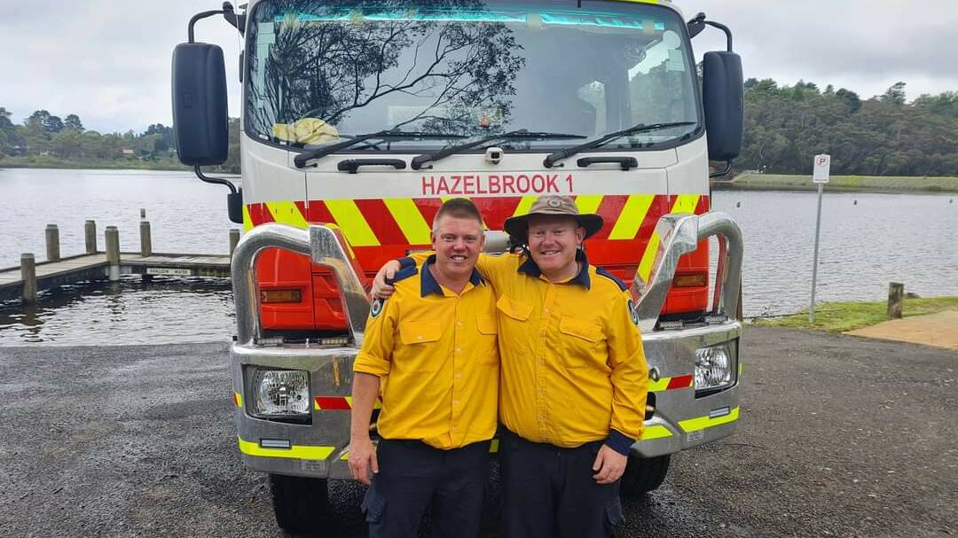 Telling stories of Australia's military history: Deputy captain Adam Blum (right) from Hazelbrook Rural Fire Service, pictured with his brother Scott Blum, who is also a deputy captain.
