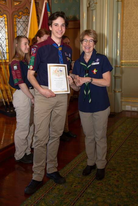 Ewan is pictured with the Governor of NSW, Margaret Beazley.