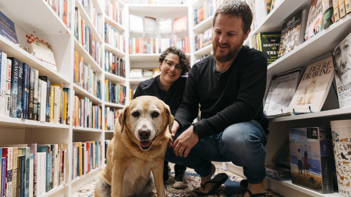 Co-founders Catherine Sell and Zac Quinn and Echo the labrador at their old premises. Picture supplied.