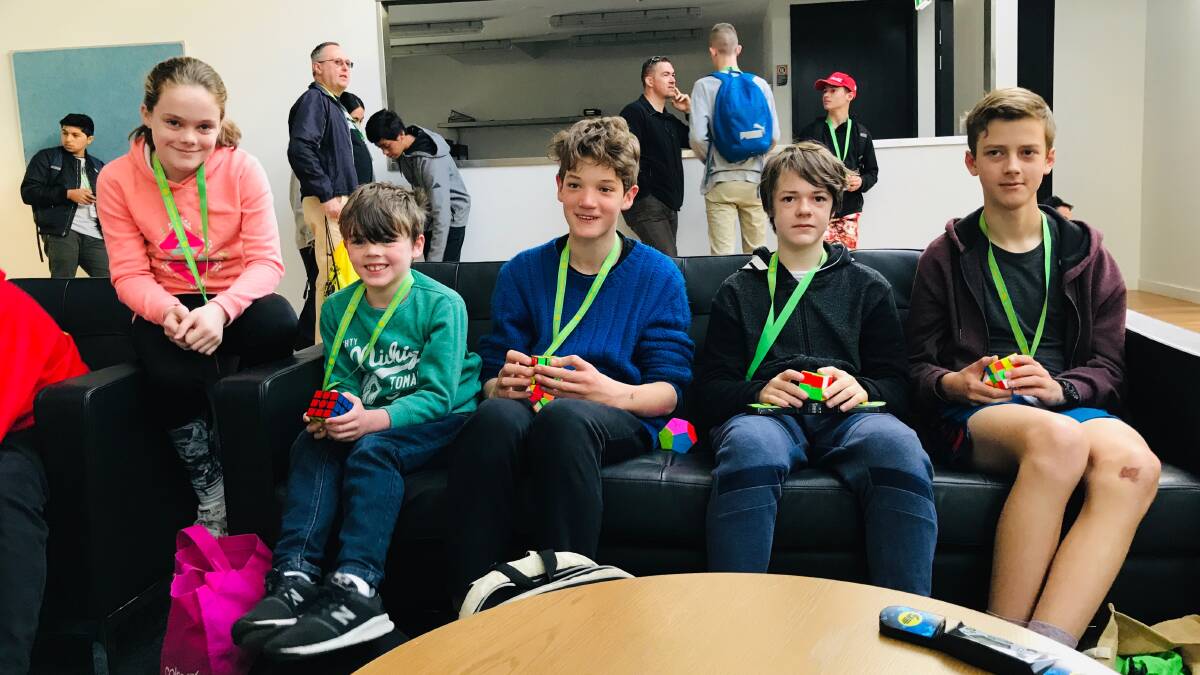 Best selling toy ever: New cubers to the Mountains are Alexis Munoz, Liam West, Eric Downes, Jasper Musgrave and Noah Snedden at WCA Cube Competition Sydney, in August.