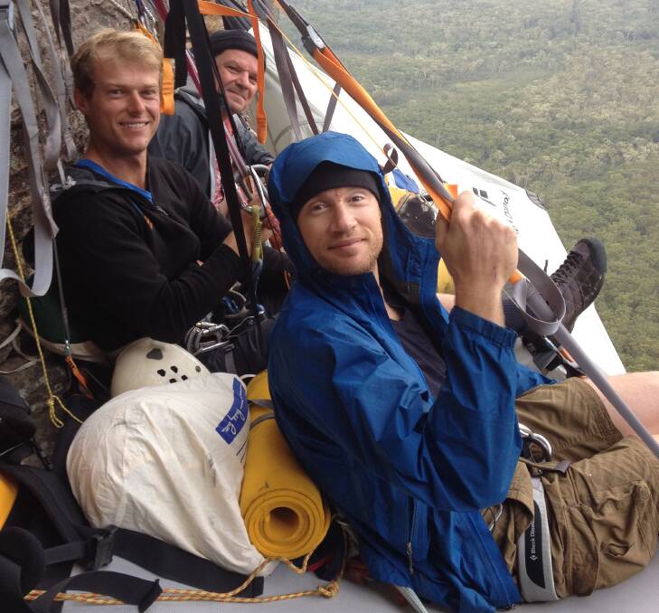 On the edge: Cricketer Andrew "Freddie" Flintoff hangs off a Blue Mountains cliff for Freddie Fries Down Under TV show. With Blue Mountains Adventure guide Marty Doolan and TV sidekick Rob Penn.