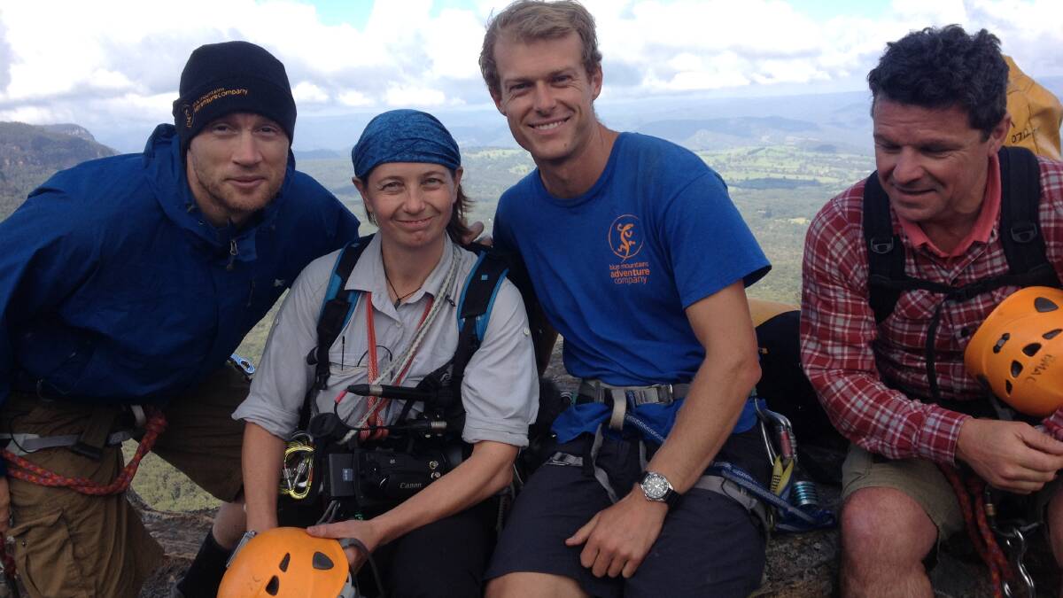 Extreme adventurers: Cricketer Andrew "Freddie" Flintoff hangs off a Blue Mountains cliff for Freddie Fries Down Under TV show. With photographer Natasha Sebire, Blue Mountains Adventure guide Marty Doolan and TV sidekick Rob Penn.