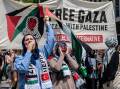 Student demonstrators in Melbourne chant slogans to express solidarity with the Palestinian cause. Picture Getty Images