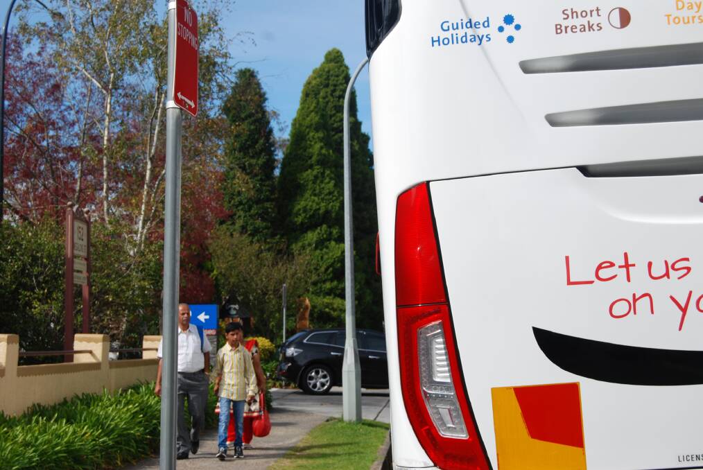 A tourist bus in the no stopping zone in Megalong St, Leura.