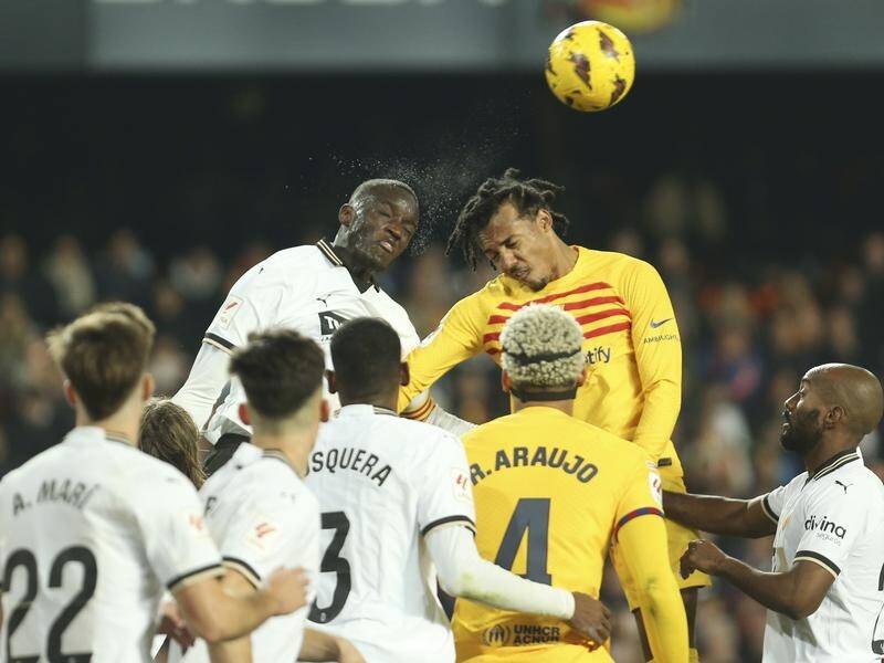 Barcelona have again failed to win in La Liga, slipping to a 1-1 draw at Valencia. (AP PHOTO)