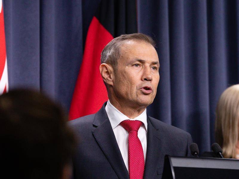 WA Health Minister Roger Cook says the risk posed by a COVID-positive NSW truck driver is low.