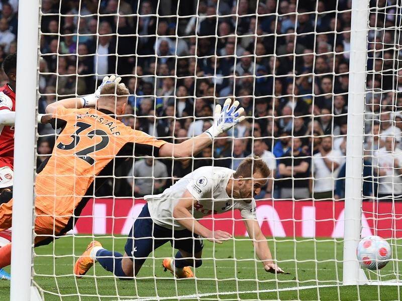 Harry Kane scores Tottenham's second goal in Spurs' 3-0 derby win over Arsenal.