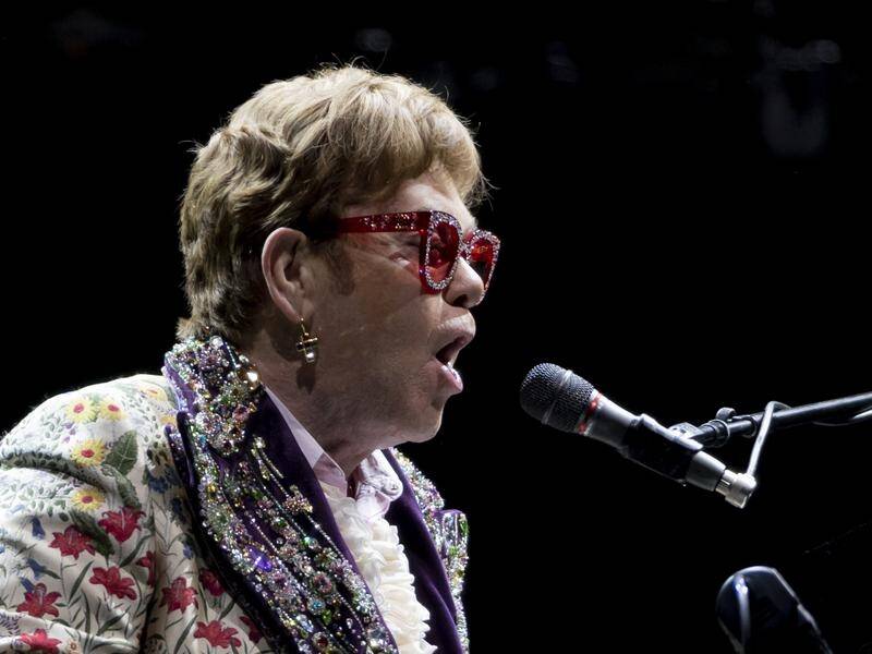 Sir Elton John has postponed his farewell tour after contracting COVID-19.