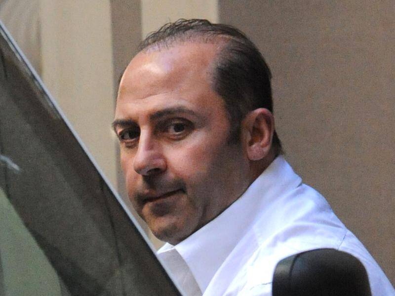 Two prison inmates have faced court charged with the attempted murder of drug kingpin Tony Mokbel.