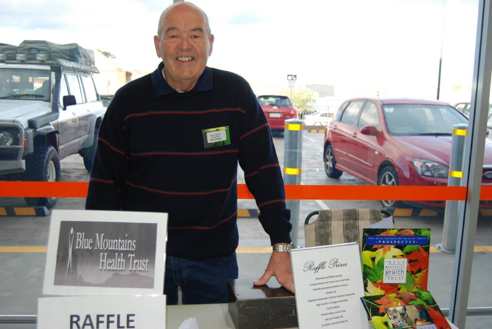 Malcolm Nicholson, OAM, selling raffle tickets for the Blue Mountains Health Trust in Katoomba last week.