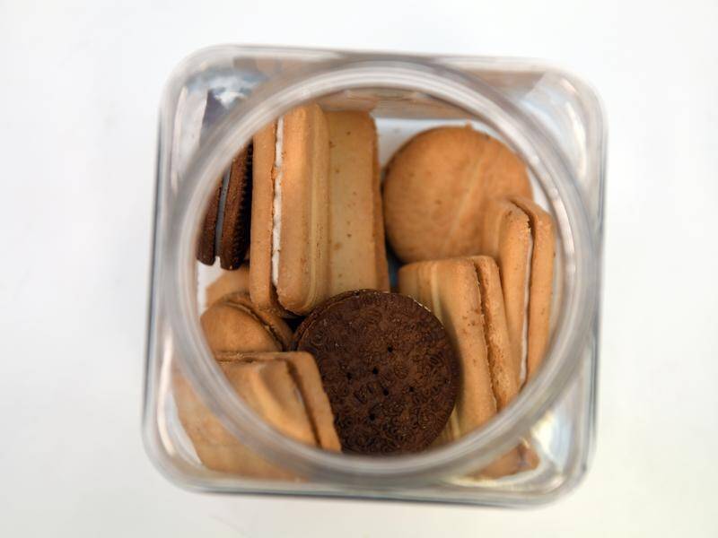 A London police officer has been accused of taking a colleague's biscuits and then lying about it.