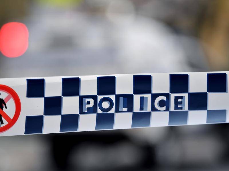 A woman has been rushed to hospital after she was stabbed in the chest at a Newcastle cafe.