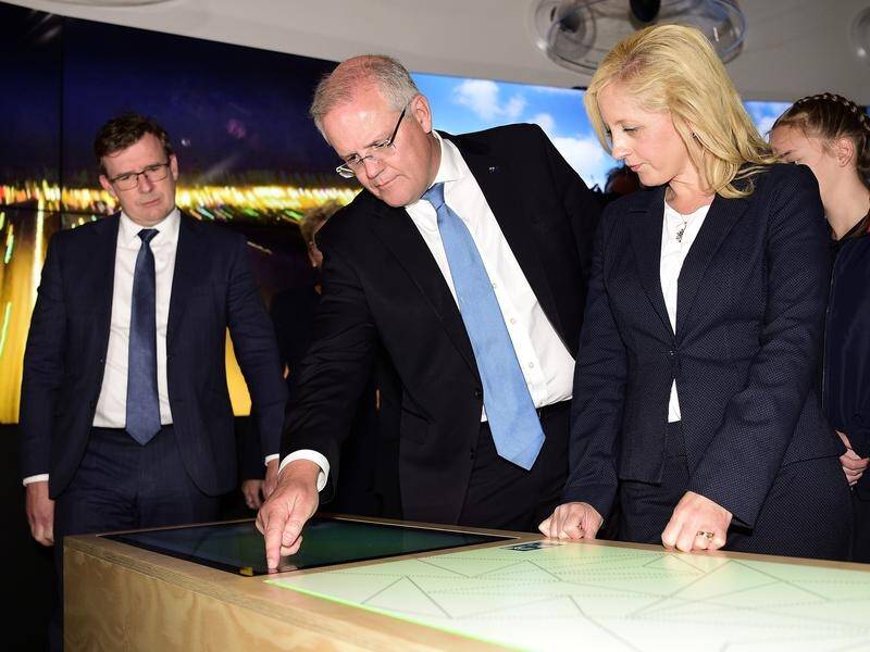 Scott Morrison (C) officially opened an interactive viewing centre for the Western Sydney airport.