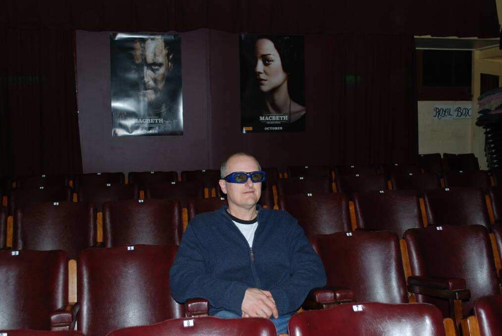 All the better to see you with: Mt Vic Flicks owner Adam Cousins wearing the new 3D glasses.