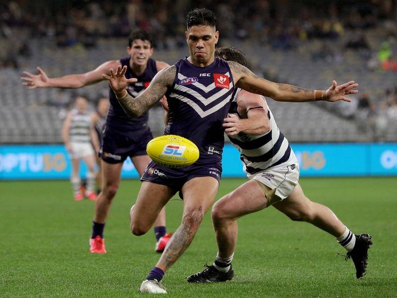 Michael Walters returns to the Fremantle side to take on Carlton in the AFL on Saturday.