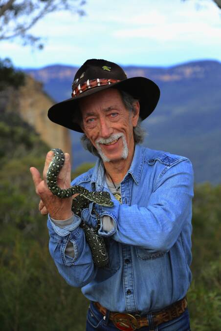 Snake man: Neville Burns has been educating the public about snakes for 40 years and has a DVD out about snakes from the Mountains.