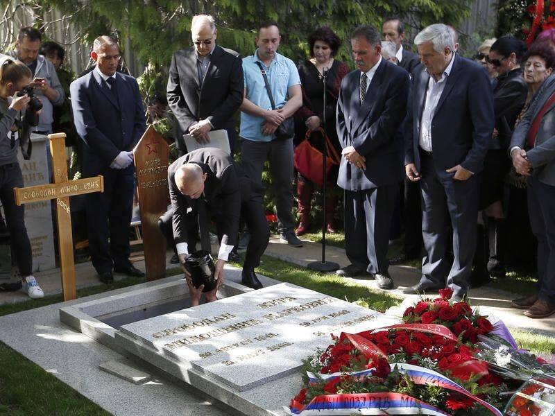 The ashes of Mirjana Markovic have been buried in her husband Slobodan Milosevic's grave in Serbia.