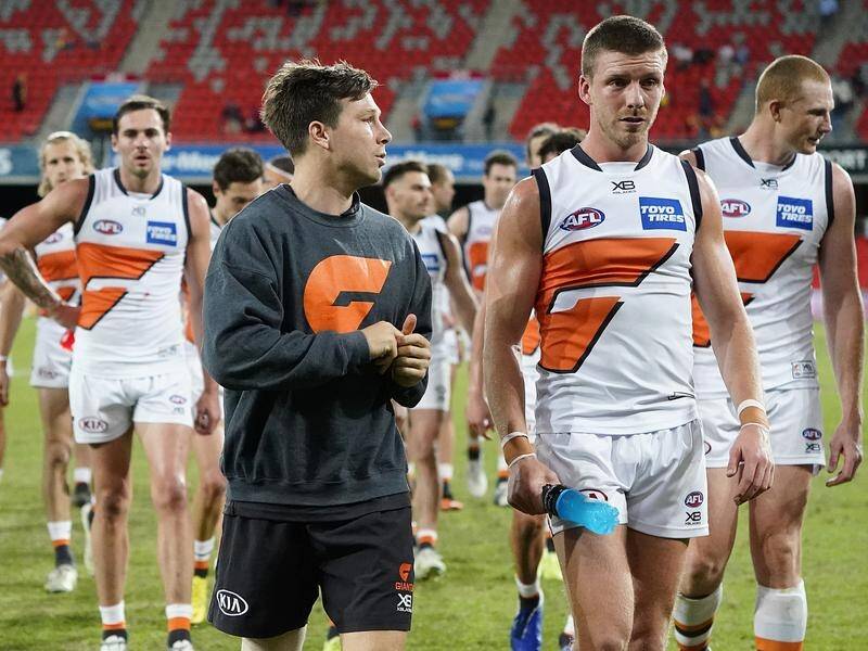 Toby Greene (left) injured his hamstring, marring an important GWS victory in round nine of the AFL.