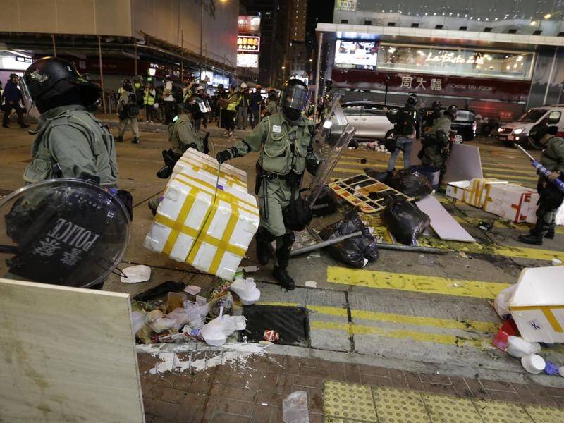 Hong Kong police have fired live rounds at protesters in the latest clash in the city.