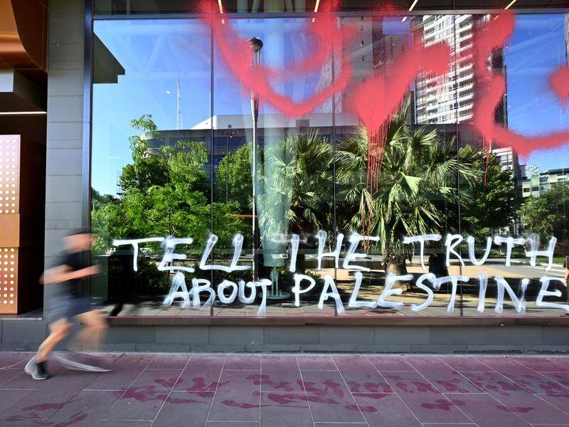 The ABC's Melbourne office has been vandalised with a message on Palestine daubed on the building. (Joel Carrett/AAP PHOTOS)