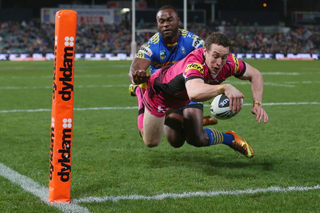 Try scorer: David Simmons of the Panthers dives over for one of his 101 career tries.   (Photo by Mark Kolbe/Getty Images)