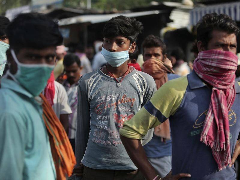 India has more than six million confirmed cases of coronavirus, the country's health ministry says.