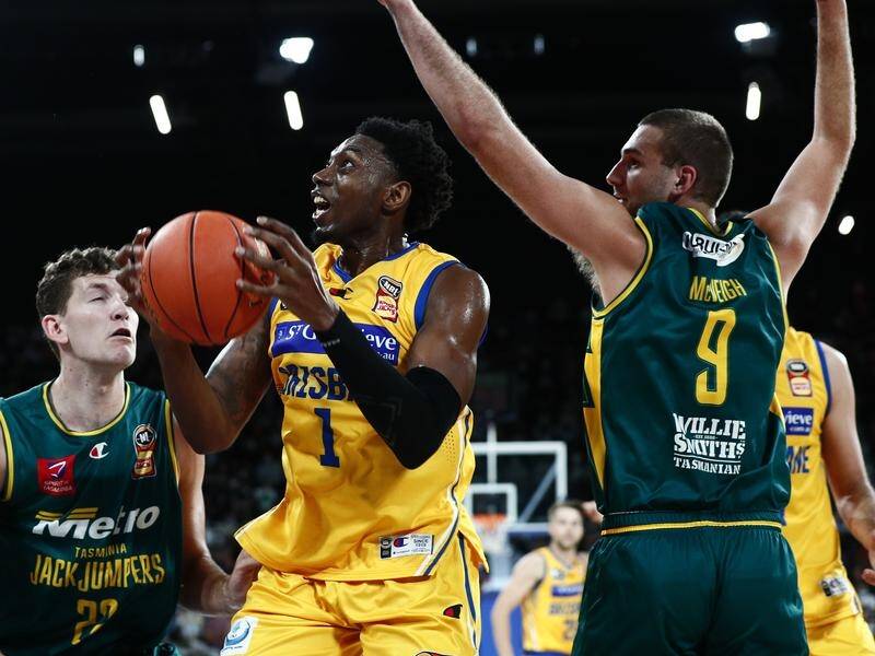The Tasmania JackJumpers have made a stunning NBL debut, beating Brisbane 83-74 in overtime.